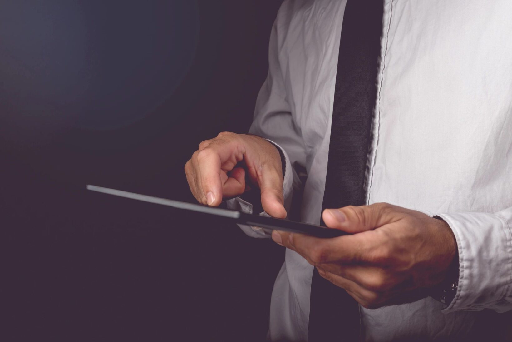 qtq80-mSeAR3 Business man looking at tablet