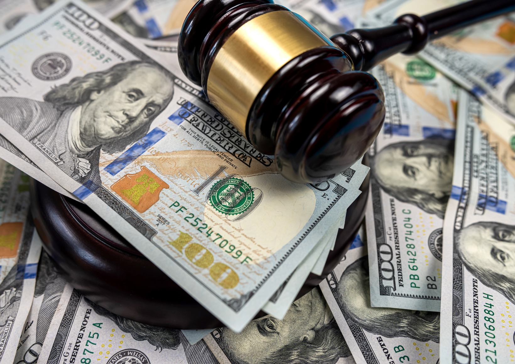 gavel-cash-dollar-bills-and-financial-crimes.jpg_s=1024x1024&w=is&k=20&c=uWpSj30DXZ9ompV2aNsqVt29NdVkFzDUUjLFI0tIllk= $91 Million Judgment Against AIG Unit