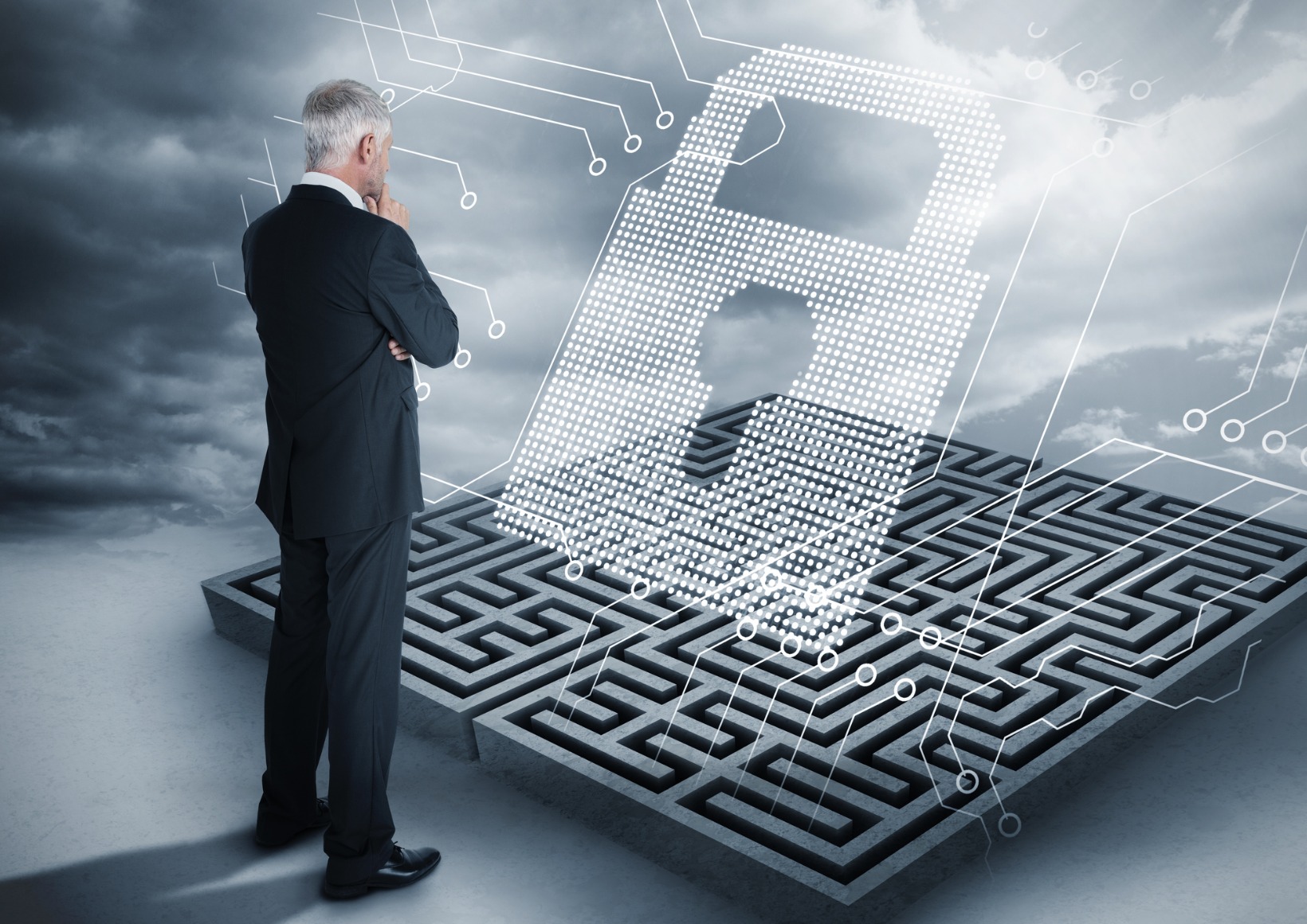 puzzled-businessman-looking-at-giant-padlock-on-a-maze.jpg_s=1024x1024&w=is&k=20&c=r7cgaZ1dJ8NixAGIRRe4RyI-za4pyw682WGhZfRZLEY= Strategies for Gaining Cyber Risk Management Buy-In Amid Budget Constraints and Workforce Reductions