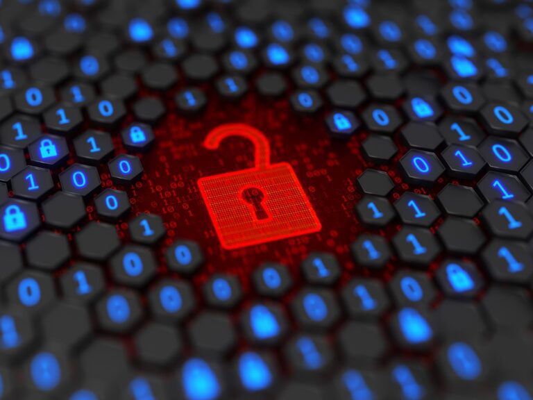 futuristic-background-with-hexagon-shell-and-hole-with-binary-code-and-opened-lock-hacker The Rising Risk and Cost of Data Breaches
